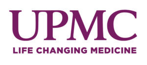 UPMC letters with the tagline "Life Changing Medicine" below. All letters in purple.